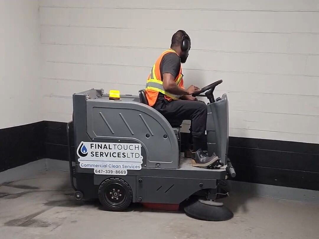 Parking garage floor cleaned by Final Touch