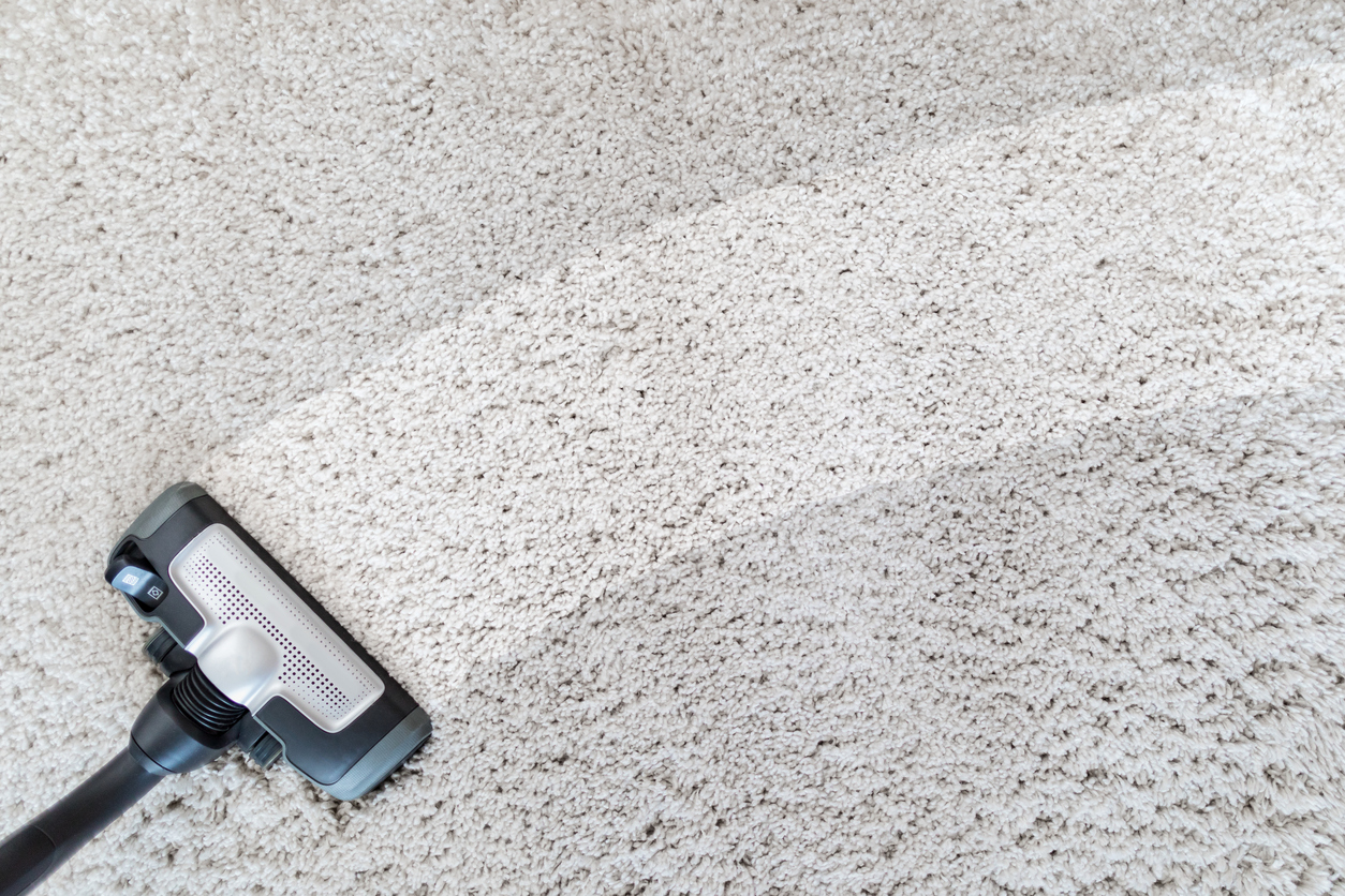 Cleaning carpet hoover. Carpet texture background.